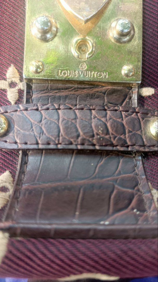 Louis Vuitton Monogram Canvas & Croc Embossed Leather Handbag (Category: Luxury Bags & Wallets) located in Kidapawan. Submitted by azythrift (Listing ID 1457797548, Image 2). Description: - Authentic Louis Vuitton handbag - Burgundy monogram canvas with brown croc embossed leather accents - Gold-tone hardware - Zipper closure - Leather lining with "Louis Vuitton Paris Made in France" stamp - Grab handles for carrying - A classic, timeless piece.