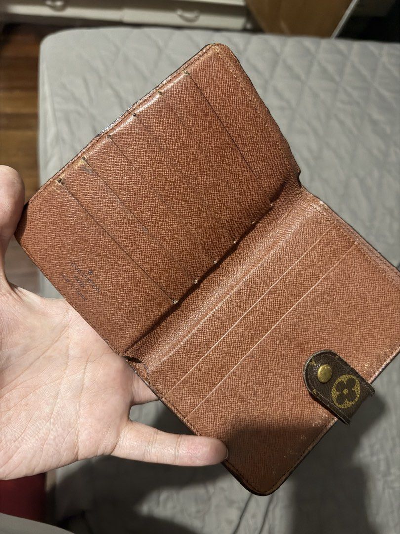Louis Vuitton Monogram Canvas Bifold Wallet (Category: Luxury Bags & Wallets) located in San Mateo. Submitted by genx13 (Listing ID 1457845575, Image 1). Description: - Authentic Louis Vuitton wallet - Classic monogram canvas - Bifold design - Multiple card slots - Secure snap closure - Shows some signs of wear consistent with use - Plenty of life left, great for everyday use.
