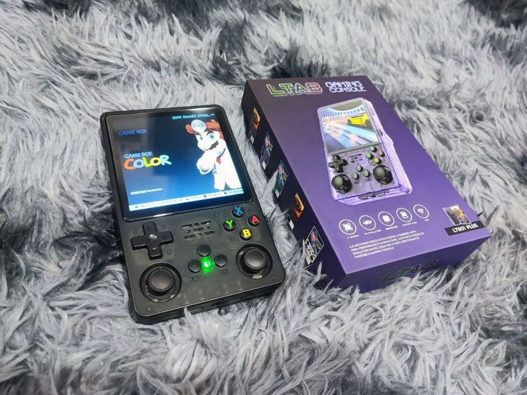 LTAB Handheld Gaming Console (Category: Others) located in Quezon City. Submitted by ladytaurus87416 (Listing ID 1457764960, Image 1). Description: - Includes original box and receipt - Ideal for portable retro gaming adventures.