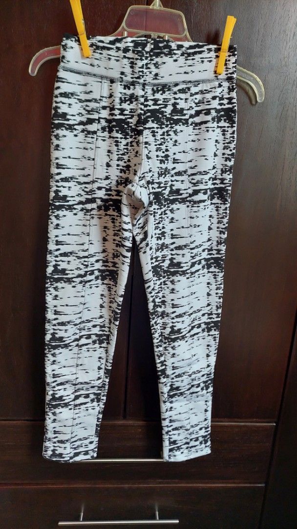 Lululemon Black & White Print Leggings (Category: Activewear) located in Paranaque City. Submitted by daddyu (Listing ID 1457738252, Image 3). Description: - Stylish black and white abstract print leggings. - Flattering high-waisted design. - Made with comfortable, stretchy fabric for all-day wear. - Versatile: perfect for workouts or casual outfits. - Waistband measures approximately 13 inches flat. - Inseam measures approximately 27 inches..
