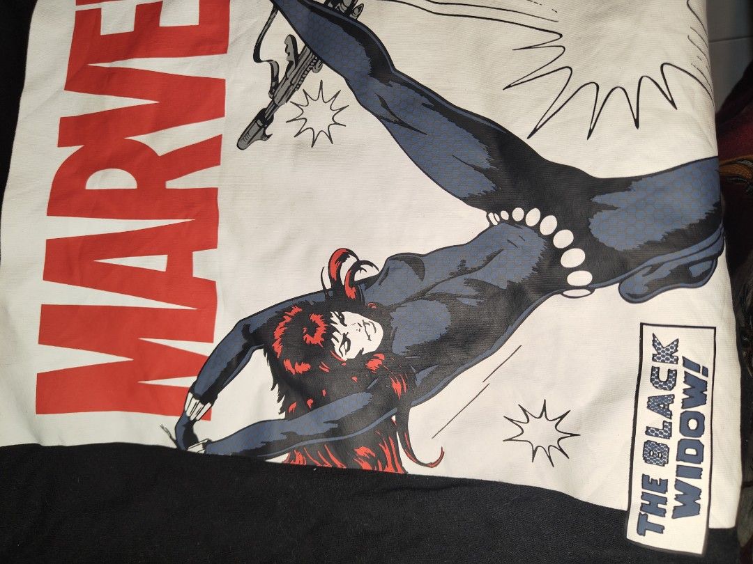 Marvel Black Widow Comic Graphic T-Shirt Size M (Category: Tshirts & Polo Shirts ) located in Zamboanga. Submitted by lunavinum (Listing ID 1457756566, Image 2). Description: - Black Marvel t-shirt - Features Black Widow in a bold, comic book style graphic - Includes iconic Marvel logo and 'The Black Widow!' text - Size: Medium - Ideal for any Marvel fan's collection.