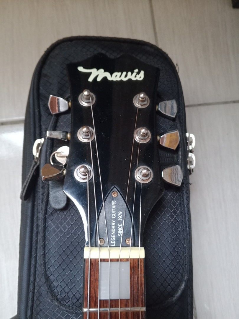 Mavis electric guitar (Category: Musical Instruments) located in Manila. Submitted by papong89 (Listing ID 1457865405, Image 3). Description: For sale! Mavis professional guitar Type: Les Paul copy pick up: 2 humbuckers No issue all pick up is properly working 9/10 Condition we're located at 5 vanguard Camarin north Caloocan #Godisgoodallthetime.