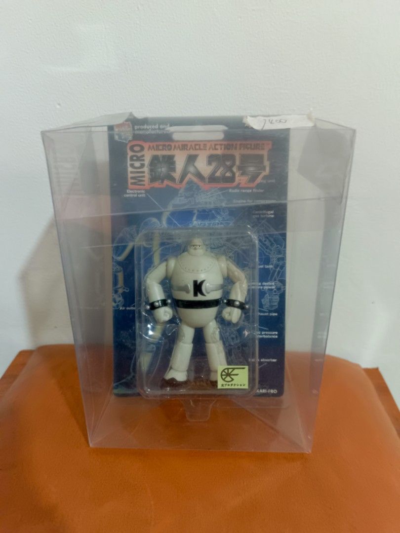 Micro Miracle Action Figure Tetsujin 28-go (Category: Figurines & Statues) located in Muntinlupa City. Submitted by kencasia (Listing ID 1457770445, Image 2). Description: - Micro Miracle Action Figure of Tetsujin 28-go - Features the iconic white robot with a black 'K' logo on its chest - Comes in its original packaging, showcasing classic series artwork - A must-have collectible for fans of vintage robots.