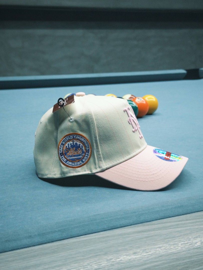 Mitchell & Ness New York Mets Baseball Cap (Category: Caps & Hats) located in Quezon City. Submitted by glborcs (Listing ID 1457772182, Image 2). Description: New York Mets Snapback Baseball Cap by Mitchell & Ness. Deets: - NY Mets logo embroidered at the front - 1969 World Series patch on the side - Mitchell & Ness embroided branding - Adjustable snapback closure - Pinstripe baseball uniform inspired design - Fit: Adjustable strap at the back Pe