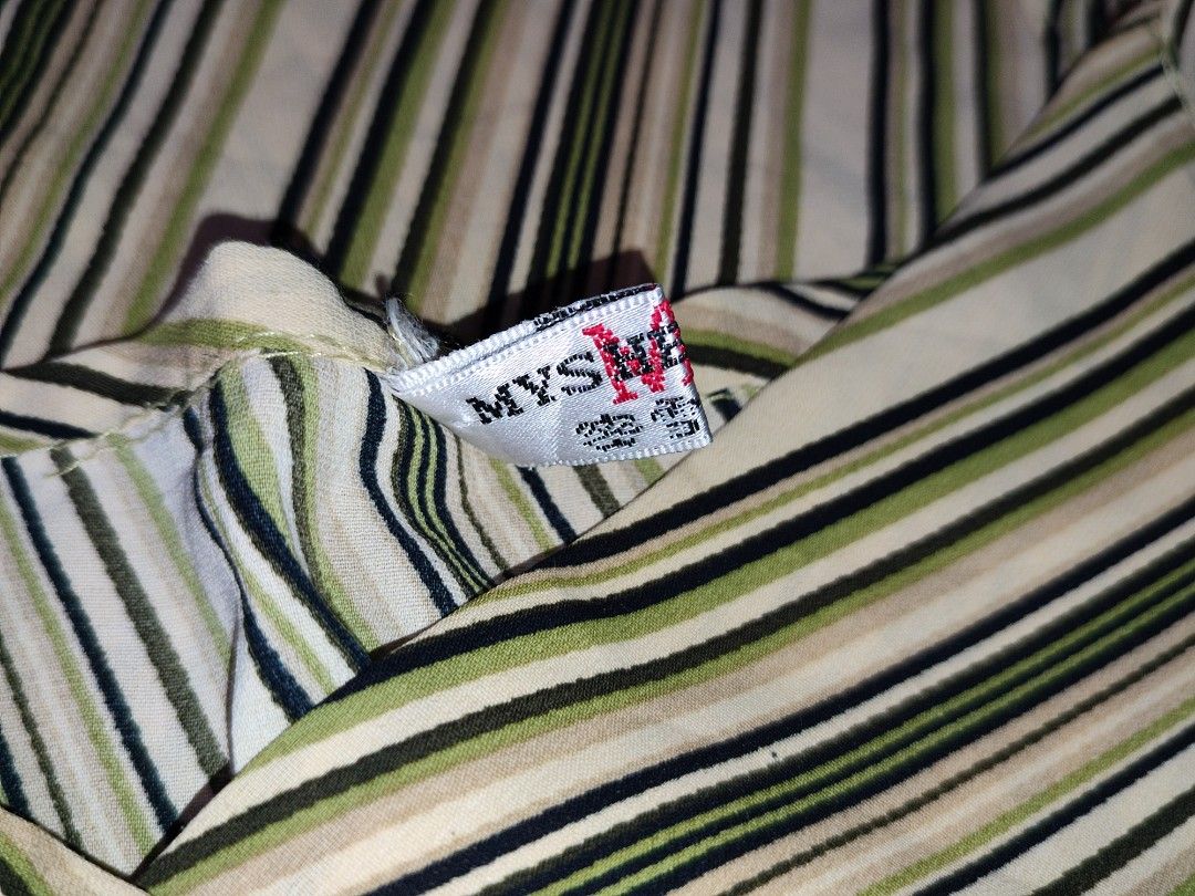 MYSHEROS striped slip dress (Category: Dresses) located in Caloocan City. Submitted by faesrie (Listing ID 1457746215, Image 3). Description: - Stylish V-neck slip dress - Features chic beige, black, and green stripes - Delicate spaghetti straps - Lightweight and flowy fabric for comfort - Versatile for casual or dressed-up looks.