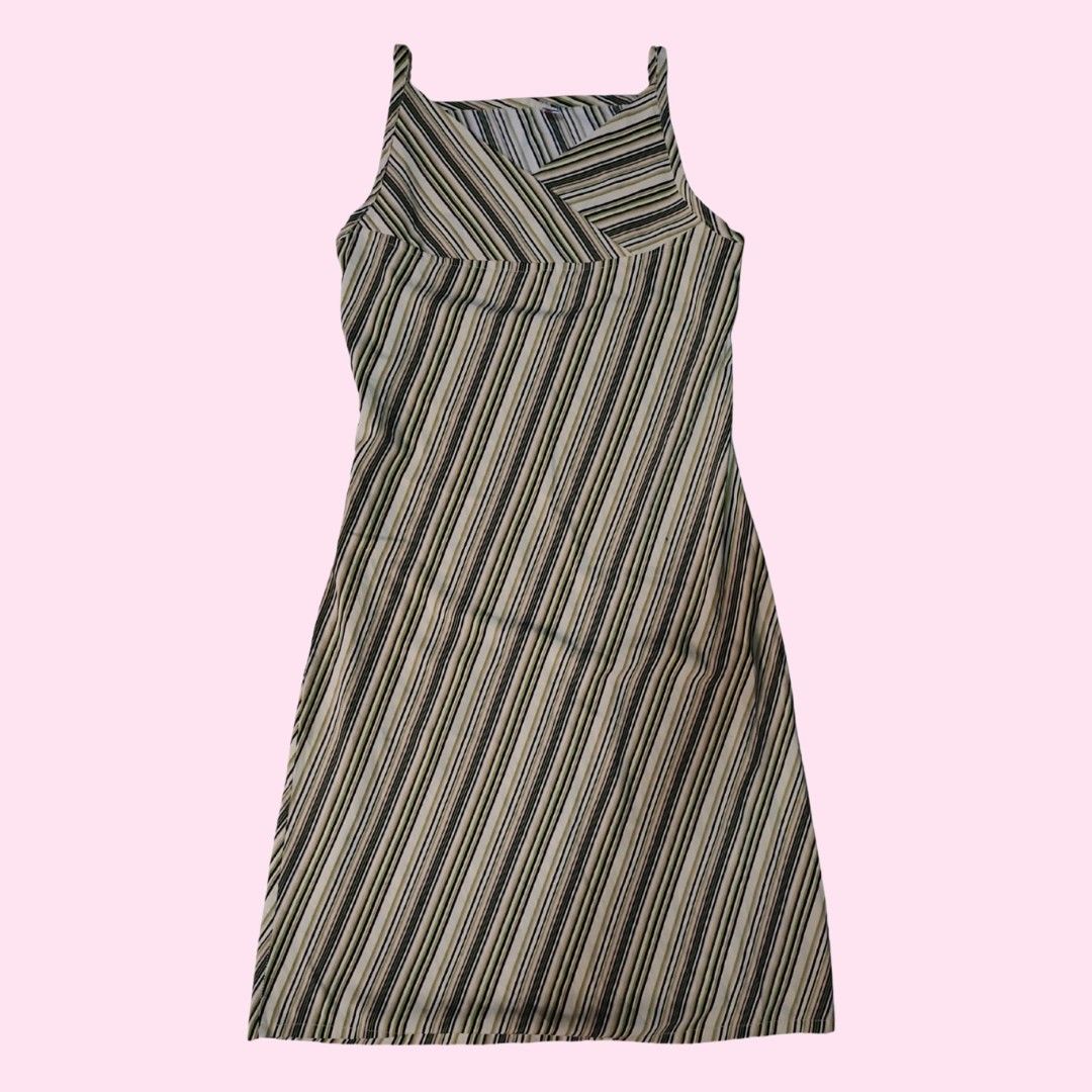 MYSHEROS striped slip dress (Category: Dresses) located in Caloocan City. Submitted by faesrie (Listing ID 1457746215, Image 1). Description: - Stylish V-neck slip dress - Features chic beige, black, and green stripes - Delicate spaghetti straps - Lightweight and flowy fabric for comfort - Versatile for casual or dressed-up looks.