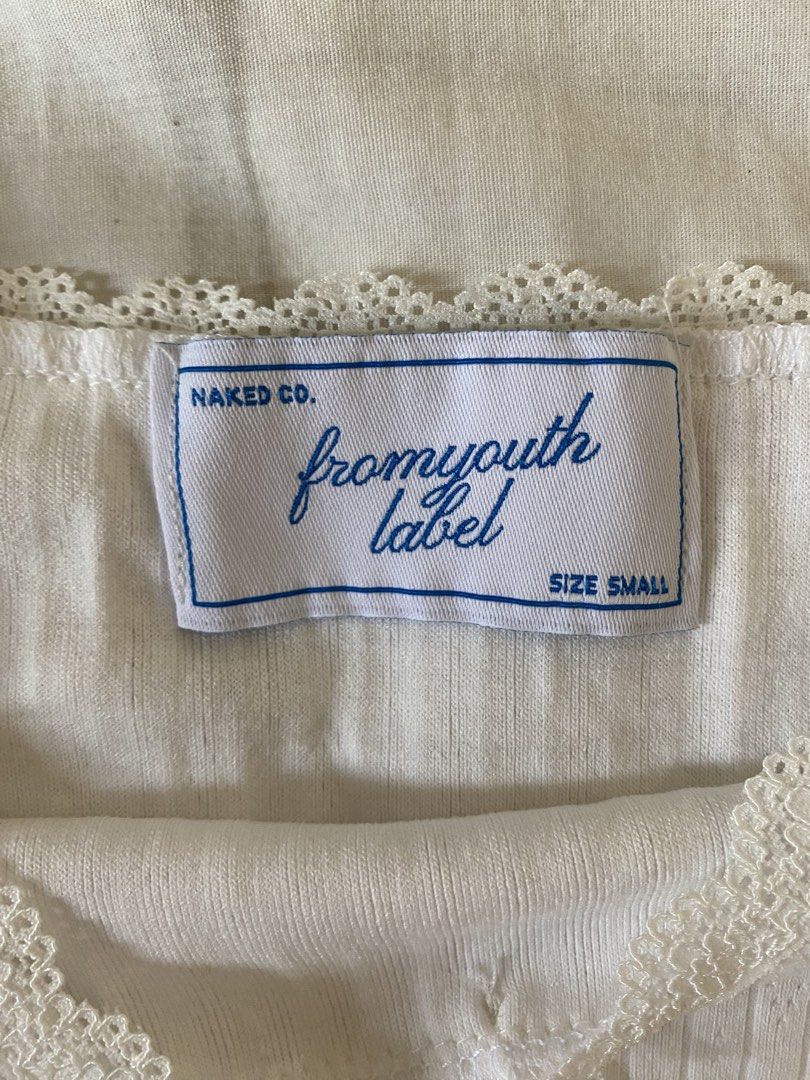 NakedbyV White Cotton Tank Top (Category: Sleeveless) located in Quezon City. Submitted by lightsnowie (Listing ID 1453728236, Image 2). Description: .