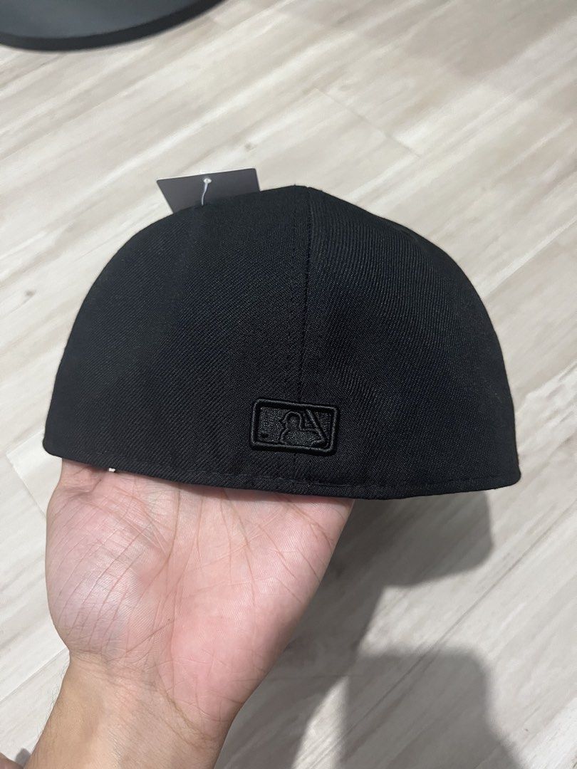 New Era Chicago White Sox Black Fitted Hat (Category: Caps & Hats) located in Legazpi City. Submitted by tr3ymann (Listing ID 1457865861, Image 2). Description: - Authentic Chicago White Sox fitted cap - Classic 'SOX' logo embroidered in black on the front - New Era branding on the side - Size: 7 1/4.