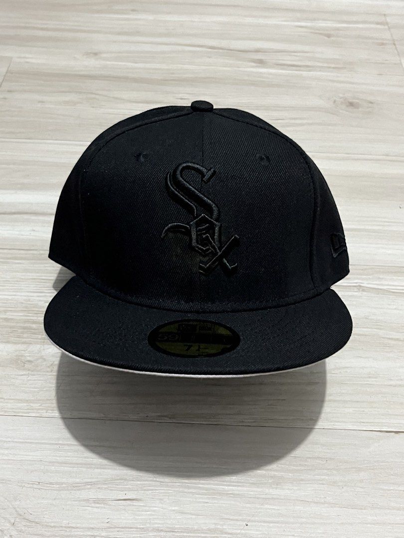 New Era Chicago White Sox Black Fitted Hat (Category: Caps & Hats) located in Legazpi City. Submitted by tr3ymann (Listing ID 1457865861, Image 1). Description: - Authentic Chicago White Sox fitted cap - Classic 'SOX' logo embroidered in black on the front - New Era branding on the side - Size: 7 1/4.