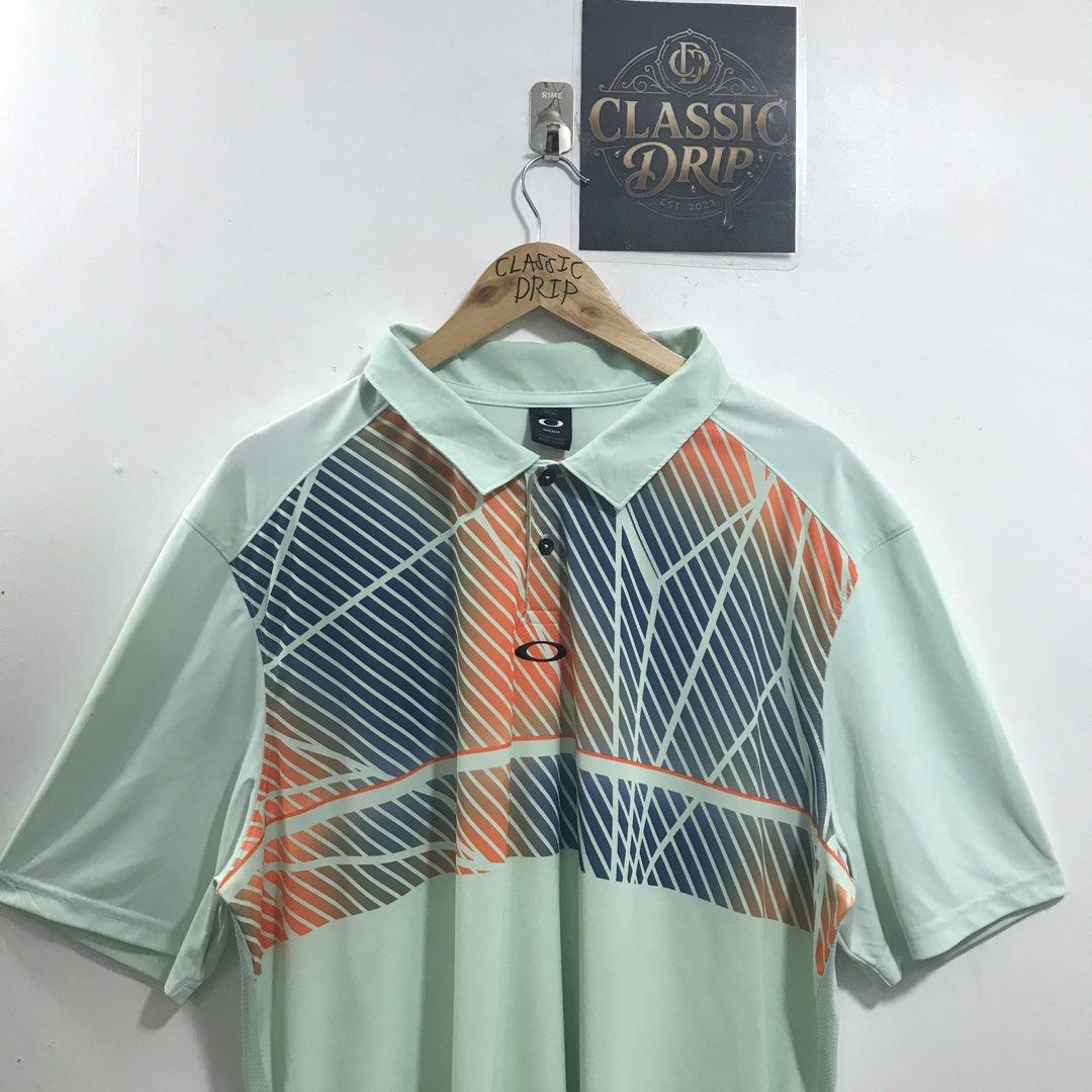 OAKLEY (Category: Tshirts & Polo Shirts ) located in Ozamiz City. Submitted by ClassicDrip (Listing ID 1457830052, Image 3). Description: OAKLEY POLO SHIRT -AUTHENTIC / LEGIT 💯 -SIZE 2XL - 25 WIDTH X 31 LENGTH - RUBBERIZED LOGOS - PRESTINE CONDITION - ANG GWAPO NITO.