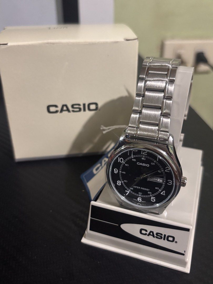 ORIGINAL CASIO MTP-V006D-1B2 (Category: Men's Watches) located in Manila. Submitted by mikaysells (Listing ID 1457813362, Image 1). Description: ORIG PRICE 2,100 selling it for 1700 NEVER WORN ONCE still has plastic and tag see the picture price still negotiable .