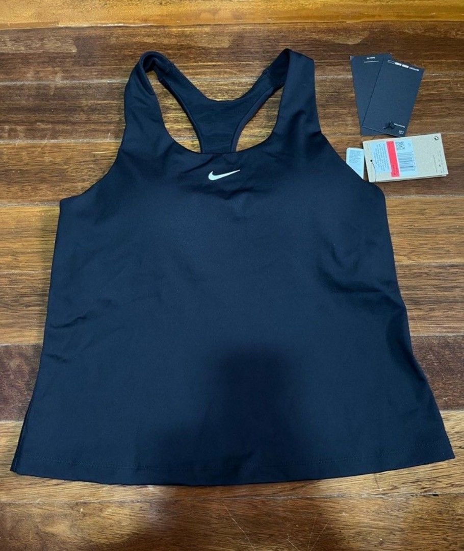 Original Nike Dri-FIT Black Racerback Tank Top with Built-in Bra (Category: Activewear) located in Lingayen. Submitted by kat_declutter (Listing ID 1457856421, Image 1). Description: -BNWT Black Nike Dri-FIT tank top -SRP on mall is 1,200 -Available size only is XXL - Racerback design for full range of motion - Built-in bra with padding for support - Ideal for workouts and everyday use - Made in Vietnam.