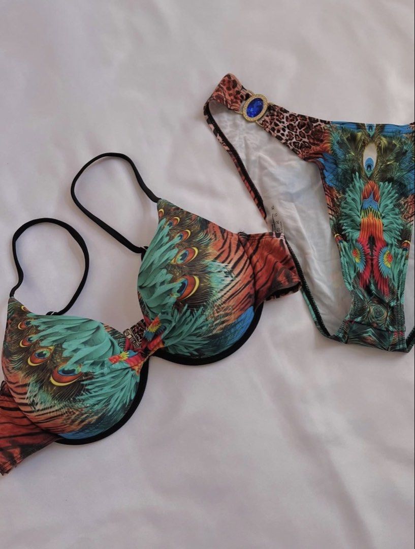 Peacock Feather Print Bikini Set with Embellishments (Category: Bikinis & Swimsuits) located in Davao. Submitted by chachaaarm (Listing ID 1457808847, Image 3). Description: Shein bikini set, XL. Peacock feather print with blue gem details on bottoms. Adjustable straps, underwire top. Great for beach/pool..