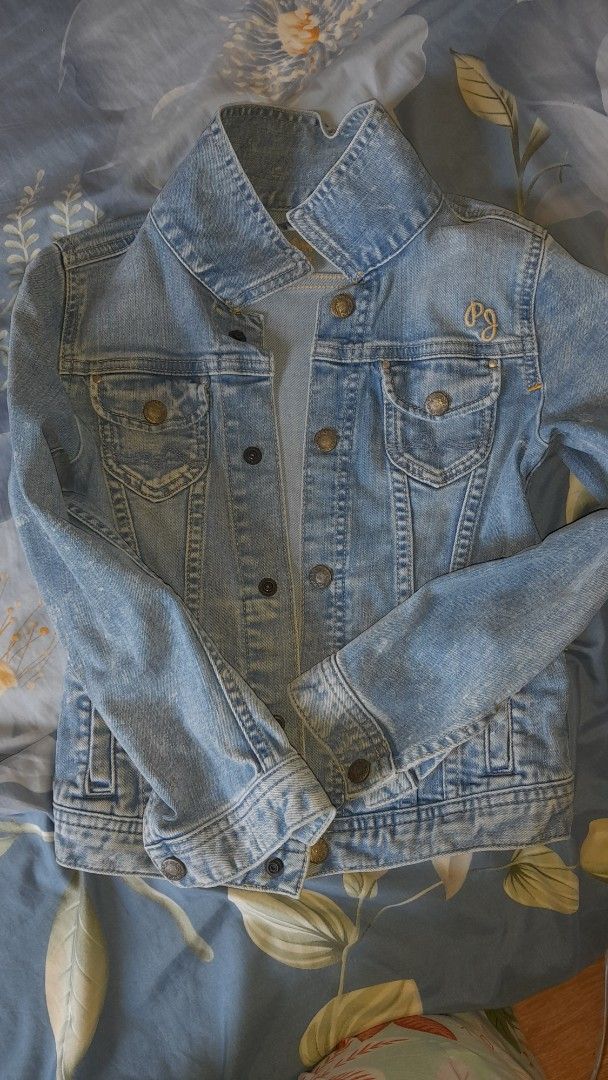Pepe Jeans Kids Denim Jacket will (Category: Coats, Jackets and Outerwear) located in Bay. Submitted by silverhorse-59c851 (Listing ID 1457754091, Image 2). Description: - Light blue denim jacket for kids - Features embroidered on chest - Button-down front closure - Two chest pockets with button flaps - Small stain on the inside near the seam (refer to last photo for detail) - Ideal for layering decluttreting my Daughter preloved.