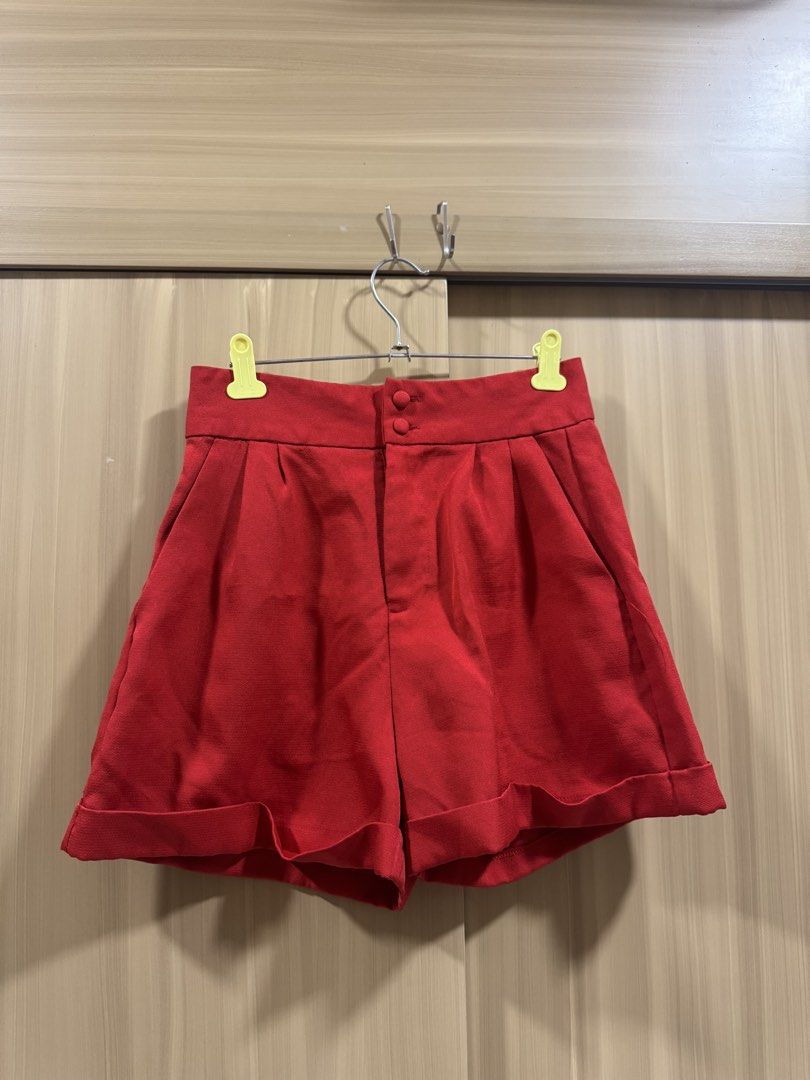 Plains & Prints Red High-Waisted Shorts (Category: Shorts) located in Manila. Submitted by declutterdoctor (Listing ID 1457893405, Image 1). Description: - Brand: Plains & Prints - Color: Red - Style: High-waisted shorts - Closure: Button closure - Features: Cuffed hem - Estimated Size: US 4 - Occasion: Casual wear or dressing up.