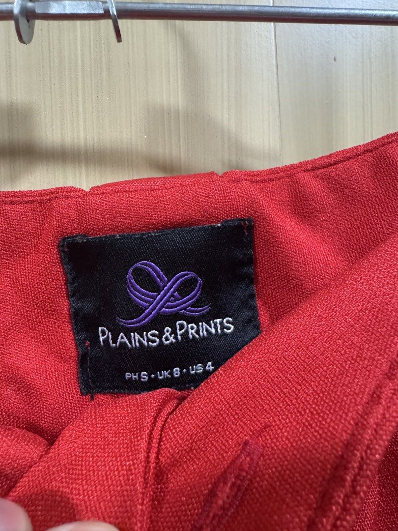 Plains & Prints Red High-Waisted Shorts (Category: Shorts) located in Manila. Submitted by declutterdoctor (Listing ID 1457893405, Image 2). Description: - Brand: Plains & Prints - Color: Red - Style: High-waisted shorts - Closure: Button closure - Features: Cuffed hem - Estimated Size: US 4 - Occasion: Casual wear or dressing up.