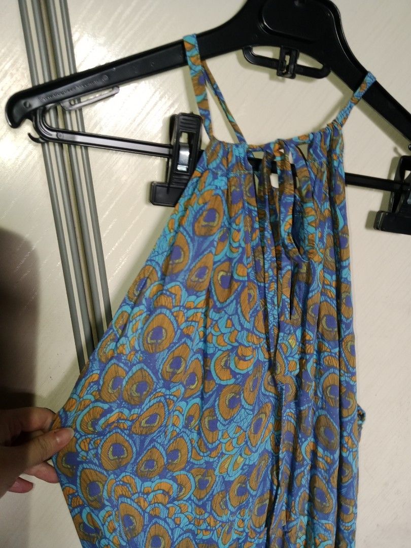 Plus sized printed halter romper (Category: Jumpsuits) located in Singapore. Submitted by querelle (Listing ID 1457727708, Image 2). Description: fits xl best has pockets tie at the back mailing $3 more or self collect.