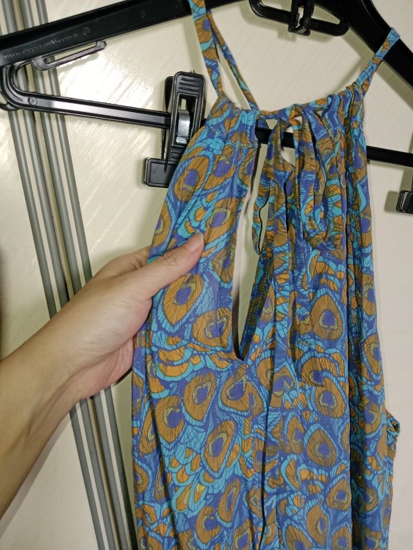 Plus sized printed halter romper (Category: Jumpsuits) located in Singapore. Submitted by querelle (Listing ID 1457727708, Image 3). Description: fits xl best has pockets tie at the back mailing $3 more or self collect.