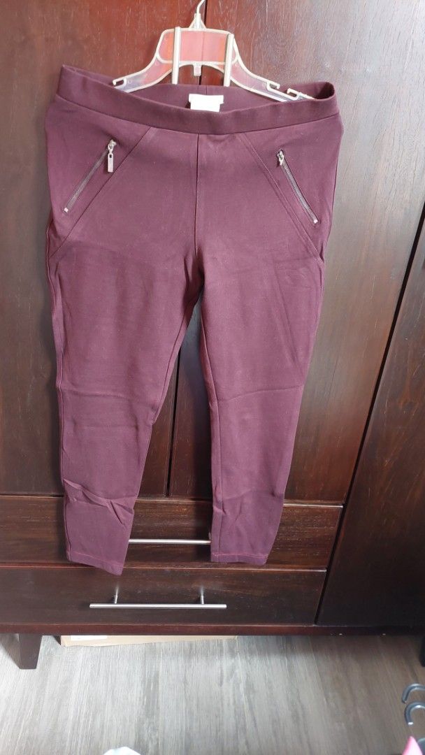 Ponte Pants Size M Burgundy (Category: Other Bottoms) located in Paranaque City. Submitted by daddyu (Listing ID 1457738856, Image 2). Description: - Burgundy ponte pants - Elastic waistband - Front zip pockets - Two back pockets - Made from rayon, nylon, and spandex blend - Comfortable and stretchy - Ideal for casual wear.