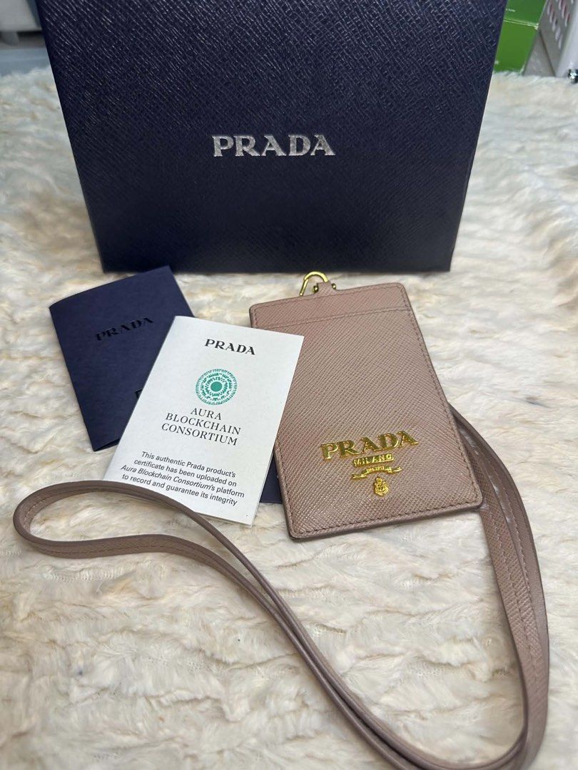 prada lanyard card holder (Category: Luxury Accessories) located in Manila. Submitted by ambercs (Listing ID 1457731204, Image 1). Description: auth prada lanyard with card slot preloved but in very good condition with box and cards cheapest in the market grab the chance🧡.