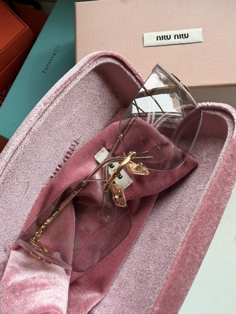 Preowned Miu MIu Sunglasses (Category: Sunglasses & Eyewear) located in Las Pinas. Submitted by twiceloved24 (Listing ID 1457764171, Image 1). Description: Selling low. Used 2-3x with minimal scratches..