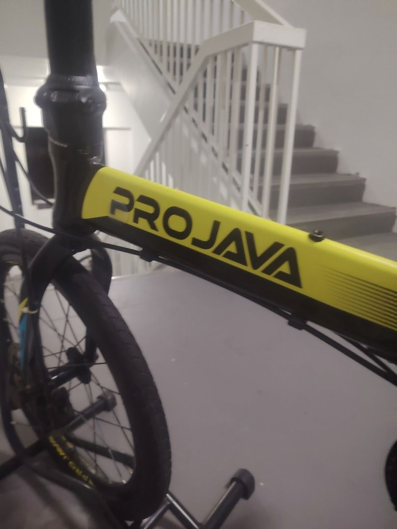 PROJAVA Folding Bicycle (Category: Bicycles) located in Singapore. Submitted by sunshine_7777 (Listing ID 1457858409, Image 7). Description: - PROJAVA folding bike - Black frame with yellow & blue accents - Front & rear disc brakes - Easy to fold and store - Ideal for commuting or casual cycling - Ready for your next ride!.