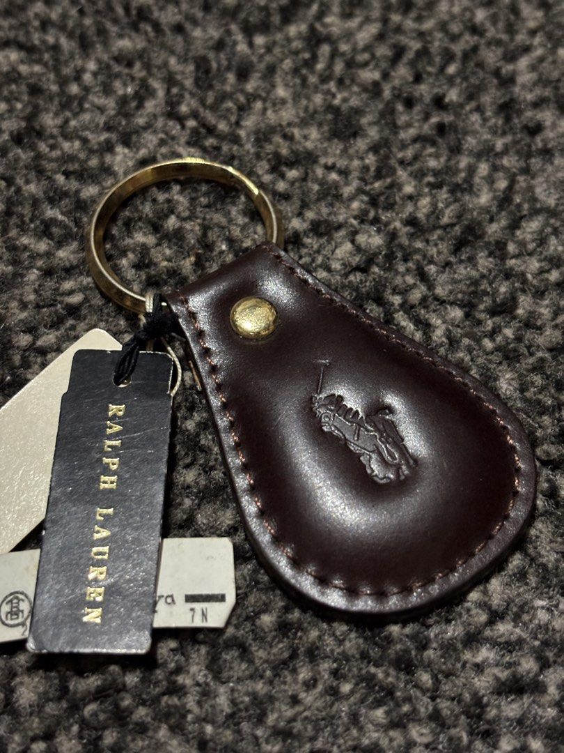 Ralph Lauren Keychain Embossed Logo (Category: Luxury Accessories) located in Bulacan. Submitted by thriftstarph (Listing ID 1457858637, Image 2). Description: PLEASE READ THE DESCRIPTION BELOW‼️ Ralph Lauren Keychain Embossed Logo Leather Material, Gold Key Ring With hang tags No Box From: Japan 1400 is just ideal price.