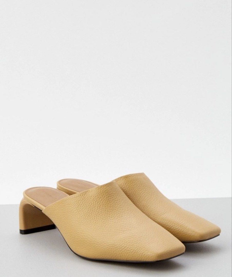 Genuine Leather Mules Heels (Category: Heels) located in Taguig. Submitted by declutterkweeen (Listing ID 1457810369, Image 1). Description: 12 Storeez Mules - real leather. 5cm heel height. Size 38. Only used once - bought from a IG story for 2700. Super chic! RFS: doen’t fit pala :( i thought it will fit, but I’m 24.5cm..