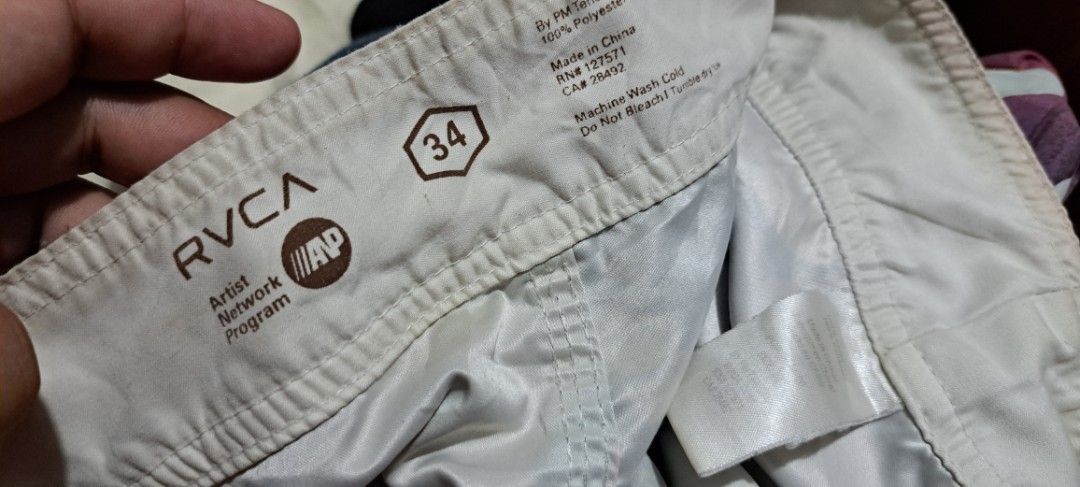 RVCA Artist Network Program Board Shorts Size 34 (Category: Shorts) located in San Fernando, Camarines Sur. Submitted by ladderaya (Listing ID 1457785773, Image 2). Description: - RVCA Artist Network Program board shorts - Size: 34 waist, 20 inch length - Unique abstract print with circles - Features drawstring waist and velcro fly - Small issue noted, please check photos - Perfect for swimming or casual wear.