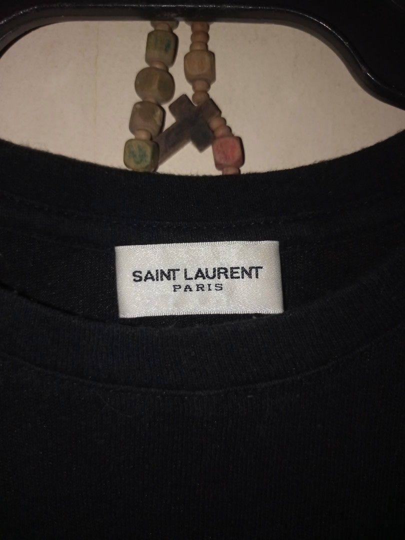 Saint Laurent Paris cassandre wool shirt (Category: Shirts) located in Manila. Submitted by kenny200024 (Listing ID 1457724358, Image 3). Description: Saint Laurent Paris cassandre wool shirt - size medium - width 16.5 | length 25 - very good condition - cut wash tag - price is negotiable 😊.
