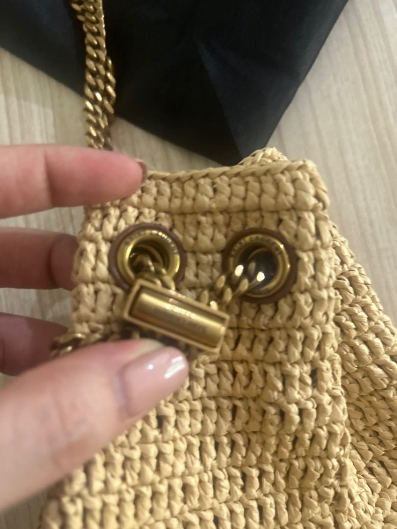 Saint Laurent Straw Bucket Bag with Chain Strap (Category: Luxury Bags & Wallets) located in Cebu City. Submitted by serene_simplicity (Listing ID 1457728568, Image 3). Description: - “OG quality” Saint Laurent bucket bag - Woven straw material - Signature gold YSL logo - Leather top handle - Gold chain strap - Includes original dust bag - Ideal for summer outings.