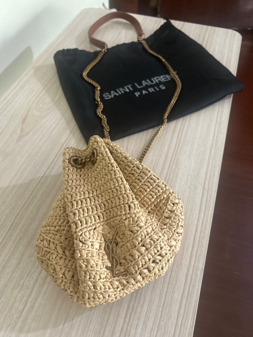 Saint Laurent Straw Bucket Bag with Chain Strap (Category: Luxury Bags & Wallets) located in Cebu City. Submitted by serene_simplicity (Listing ID 1457728568, Image 1). Description: - “OG quality” Saint Laurent bucket bag - Woven straw material - Signature gold YSL logo - Leather top handle - Gold chain strap - Includes original dust bag - Ideal for summer outings.