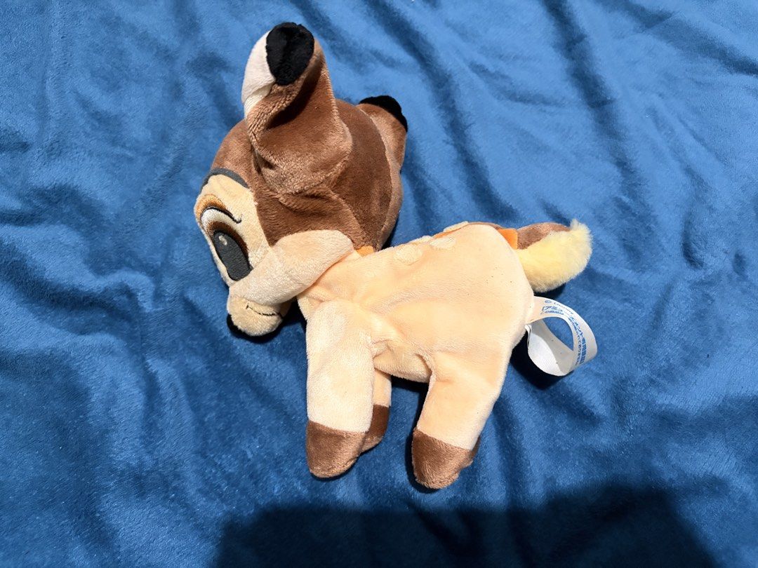 SEGA Beaded Bambi Plush Toy 2005 (Category: Plushies & Soft Toys) located in Balayan. Submitted by tacortz (Listing ID 1457837420, Image 1). Description: - Cute Bambi plush toy from SEGA - Soft and cuddly - 20 cm tall - Original tag attached - Ideal for Disney fans and collectors.
