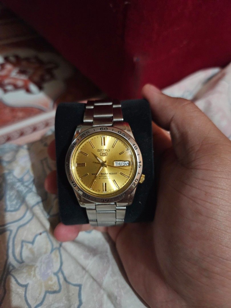 Seiko 5 sports explorer (Category: Luxury Watches) located in Manila. Submitted by arliemonto26003 (Listing ID 1457752661, Image 1). Description: For sale Seiko 5 sports explorer gold dial with box Pwede sa masalen 9/10 condition 4000 negotiable Taguig meetup or lalamove.