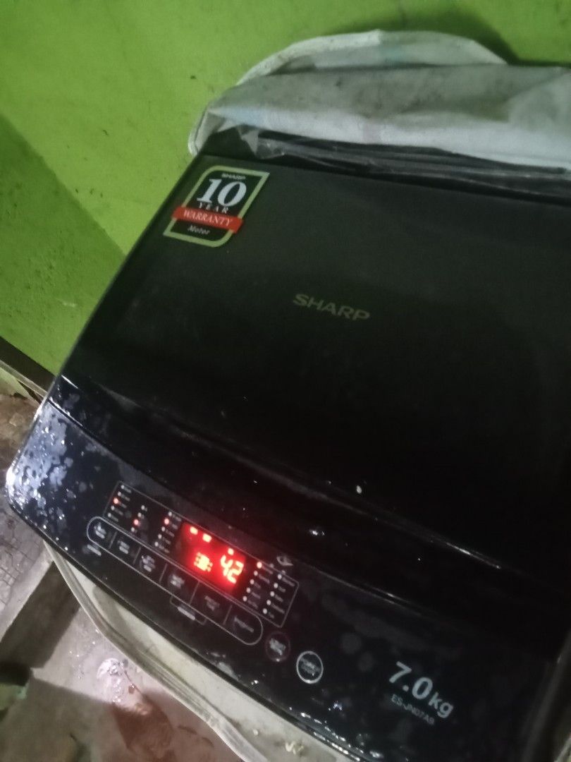 Sharp 7.0kg Top Load Washing Machine ES-JN07A9 (Category: Washing Machines and Dryers) located in Manila. Submitted by lanceydowp (Listing ID 1457772647, Image 3). Description: - Sharp Top Load Washing Machine - 7.0kg Capacity - Model: ES-JN07A9 - Digital Display (shows time remaining) - 10-Year Motor Warranty - Works well - Selling due to upgrade to a bigger unit - Pickup only.