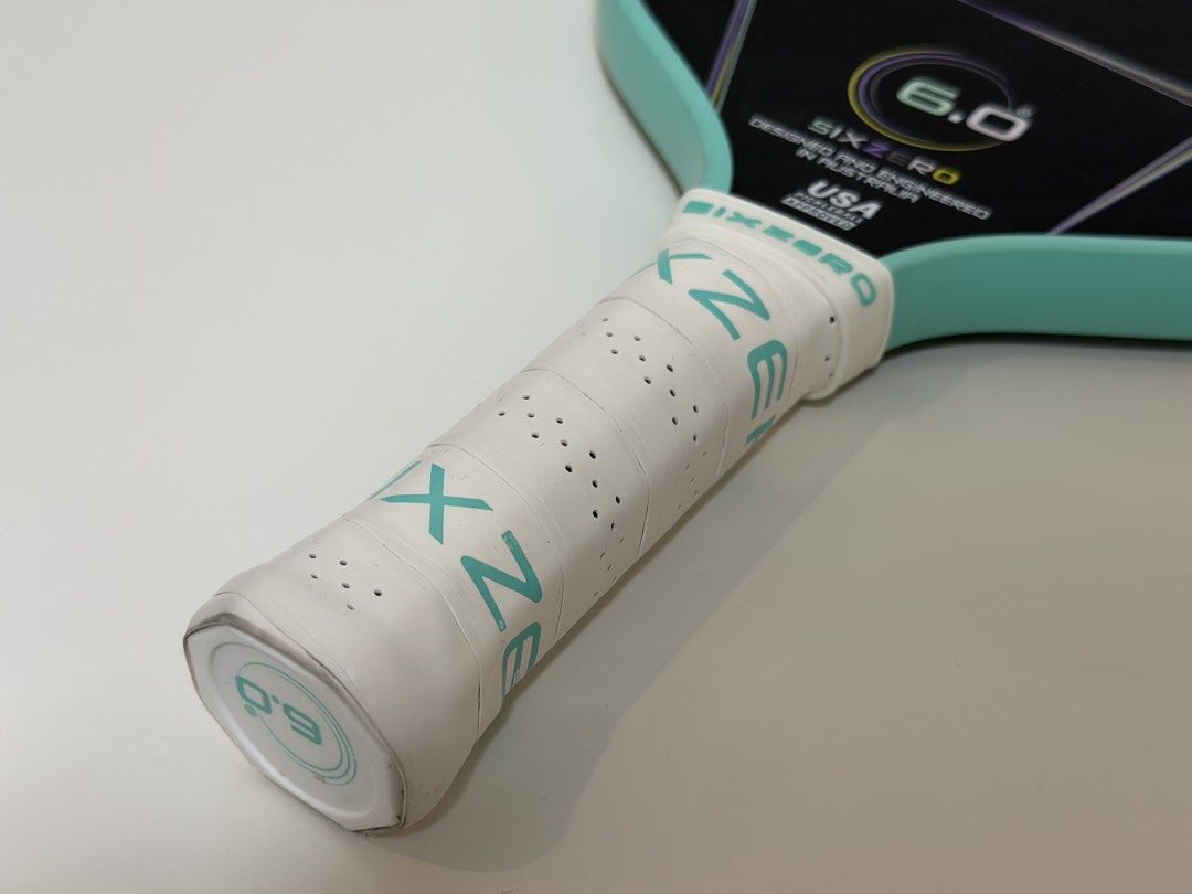 Six Zero Quartz Teal Pickleball Paddle (Category: Racket and Ball Sports) located in Quezon City. Submitted by ollietaba (Listing ID 1457872317, Image 2). Description: 15mm all-around paddle with a large sweet spot, great control, stability, power & pop. — Perfect for beginners to intermediate players — 4,000 Condition: — Minor scratches & small dents from regular use — barely noticeable once covered with a PPF — Signs of use on the handle since 