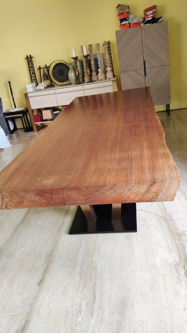 Solid Balau Wood Dining Table Rectangular (Category: Tables & Sets) located in Petaling Jaya. Submitted by lauren193 (Listing ID 1457870664, Image 1). Description: Solid balau wood live edge dining table. Unique natural wood grain with modern metal base. Approx. 10 ft length x 4 ft width x 4.6 inches height. Available for viewing. Delivery charges separately depending on location as table is heavy (need 8 persons to carry)..