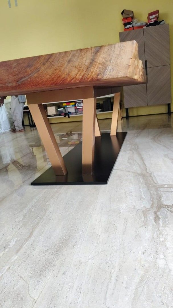 Solid Balau Wood Dining Table Rectangular (Category: Tables & Sets) located in Petaling Jaya. Submitted by lauren193 (Listing ID 1457870664, Image 2). Description: Solid balau wood live edge dining table. Unique natural wood grain with modern metal base. Approx. 10 ft length x 4 ft width x 4.6 inches height. Available for viewing. Delivery charges separately depending on location as table is heavy (need 8 persons to carry)..