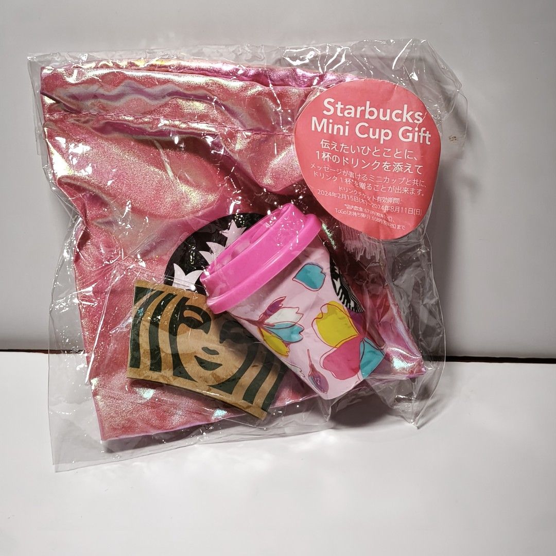 Starbucks Mini Cup Gift Set with pouch Sakura 2024 (Category: Beverages) located in Manila. Submitted by abbey.lee (Listing ID 1457813663, Image 1). Description: - Adorable pink mini cup with a charming floral design. - Includes a classic Starbucks logo sticker. - Comes with a stylish pink pouch for easy carrying. - Features a drink ticket valid from February 15, 2024, to August 11, 2024. - An ideal and thoughtful gift for any Starbucks fan!.