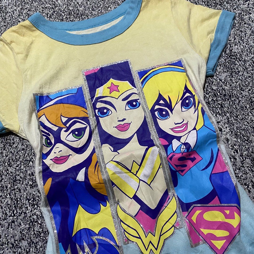 Super hero tees (Category: Shirts) located in Quezon City. Submitted by semantaryrave (Listing ID 1457801862, Image 2). Description: Super hero tees Size large Good condition Width- 14 Length- 23 .