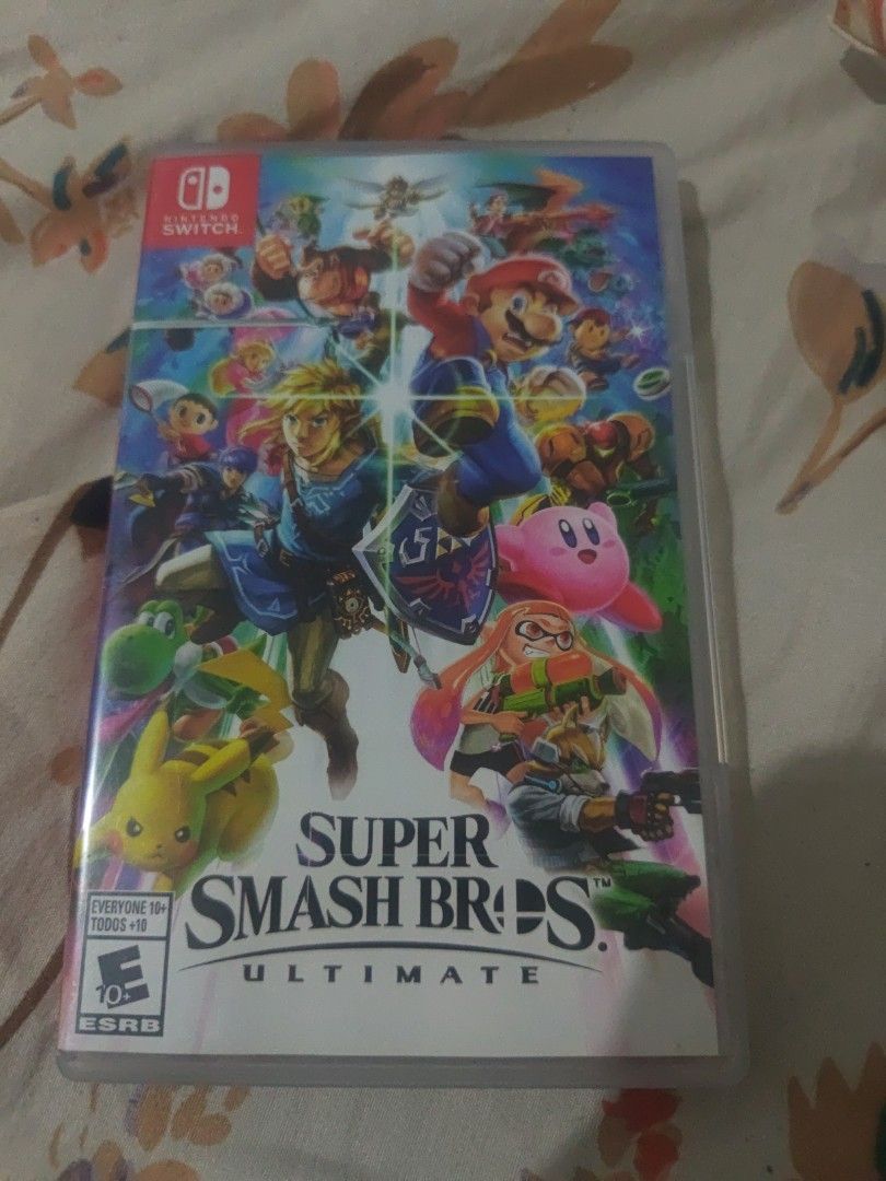 Super Smash Bros. Ultimate Nintendo Switch Game (Category: Nintendo) located in Manila. Submitted by chiki_chem (Listing ID 1457868241, Image 1). Description: - Super Smash Bros. Ultimate for Nintendo Switch - Features all your favorite characters - Ideal for both party play and solo adventures - ESRB Rating: E10+ (Everyone 10+).