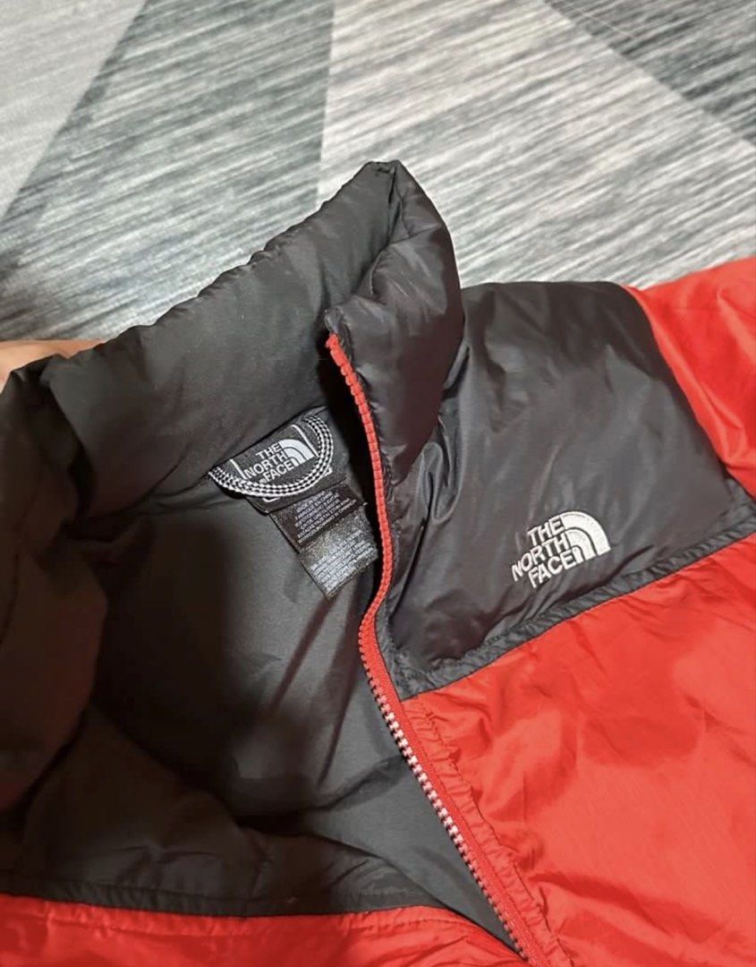 The North Face Puffer Jacket (Category: Coats, Jackets and Outerwear) located in Subic. Submitted by declutterbyshit (Listing ID 1457888678, Image 2). Description: - Red puffer jacket from The North Face (Small mens 25x20.5) - Zippered pockets - 550 fill power for excellent warmth - Perfect for staying cozy.
