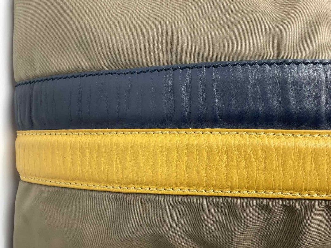 Tod's men's sling bag (Category: Luxury Bags & Wallets) located in Caloocan City. Submitted by siftedthriftedph (Listing ID 1457769293, Image 2). Description: Tod's nylon sling bag - Maganda quality, genuine leather trims, thick canvas strap - Signs of use, bawal sa maselan pls lang, pls check all pics - Bag is still very functional for everyday; Rare ang Tod's for men ❤️ - Pls self -authenticate - L-9.84in x H-7.87 in NO when worn pics.