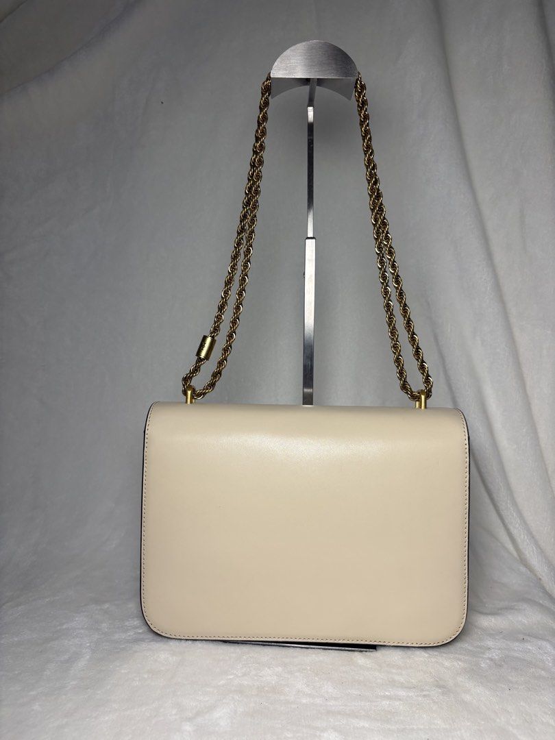 Tory Burch Chain Bag (Category: Luxury Bags & Wallets) located in Santa Rosa. Submitted by alinauy (Listing ID 1457759225, Image 2). Description: DETAILS • Authentic Tory Burch • Model: Eleanor • Color: Cream/Beige • Hardware: Gold-tone • Chain: Gold-tone • Material: Leather • Size: 18.5 cm × 6.5 cm × 13.5 cm • Condition: Like new • Inclusion: Dust bag only CONDITION • Please refer to all photos for the actual condition of the item. • Actual item