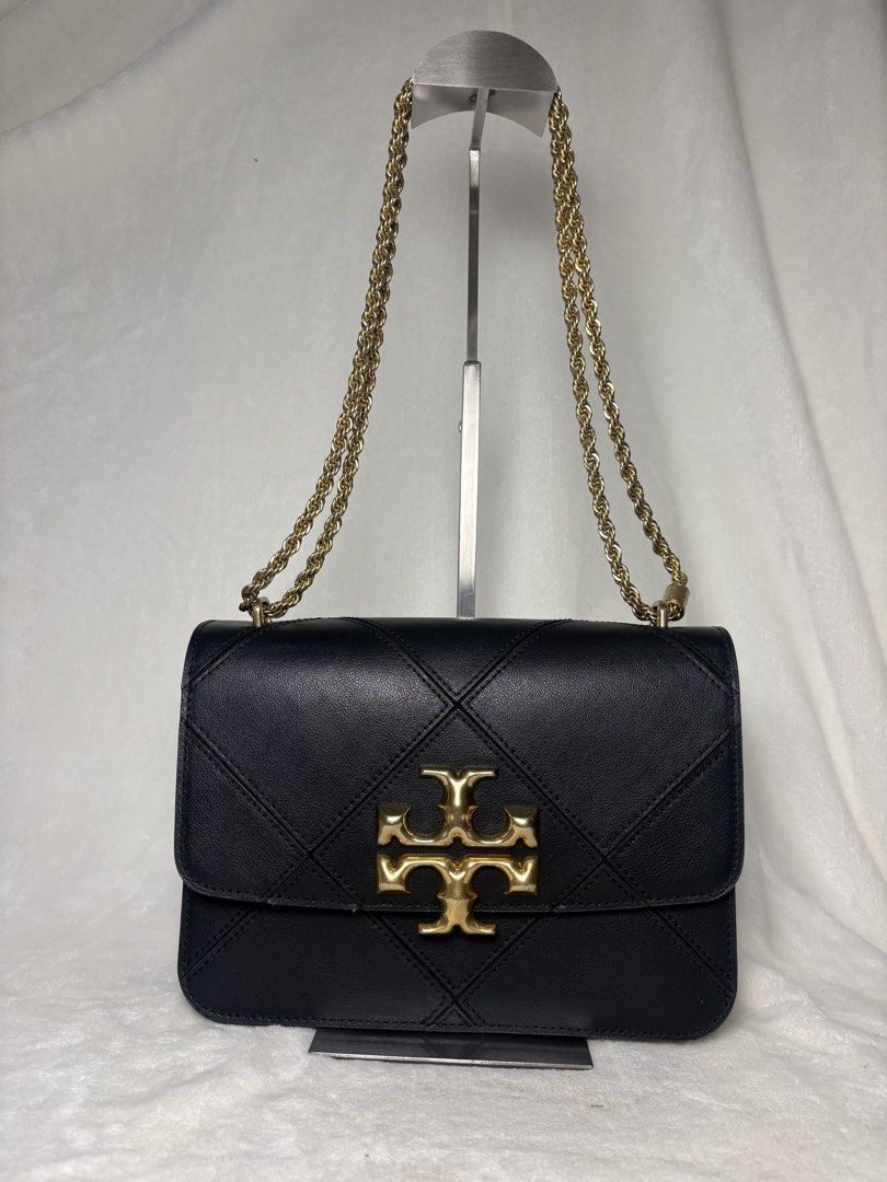 Tory Burch Eleanor Bag (Category: Luxury Bags & Wallets) located in Santa Rosa. Submitted by alinauy (Listing ID 1457764288, Image 1). Description: DETAILS • Authentic Tory Burch • Model: Eleanor • Color: Black • Hardware: Gold-tone • Chain: Gold-tone • Material: Leather • Size: 18.5 cm × 6.5 cm × 13.5 cm • Condition: Like new • Inclusion: Dust bag only CONDITION • Please refer to all photos for the actual condition of the item. • Actual item is 