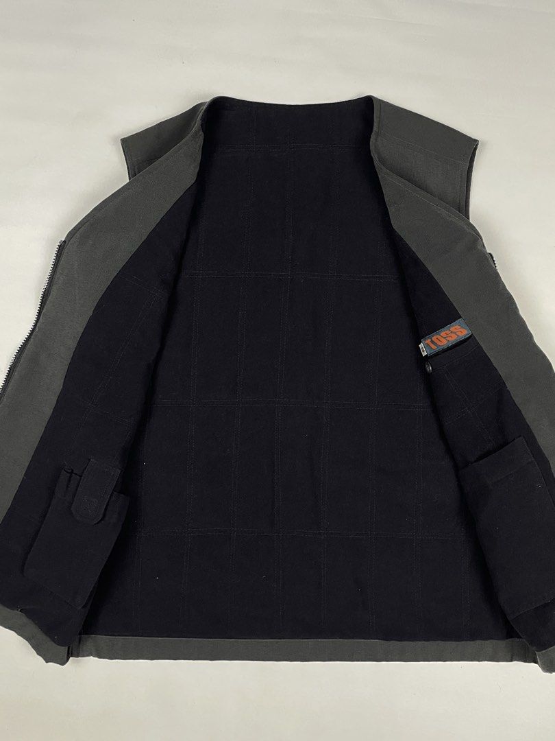 TOSS - Multipocket Vest (Category: Vests) located in Puerto Princesa. Submitted by palawan.swagdealer (Listing ID 1457804959, Image 3). Description: TOSS Multipocket Vest 48 on tag Width: 21" Length: 27" 9/10 color rate Very good condition No major flaws.