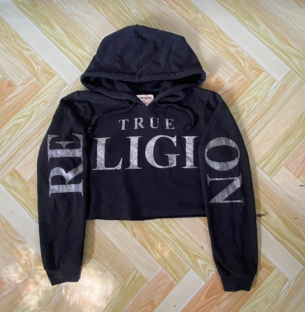 True Religion Black Cropped Hoodie (Category: Hoodies) located in Manila. Submitted by nix.thrift (Listing ID 1457771309, Image 1). Description: - Brand: True Religion - Style: Cropped Hoodie - Color: Black - Features: 'TRUE RELIGION' print across chest and sleeves, long sleeves, hood - Finish: Raw hem.