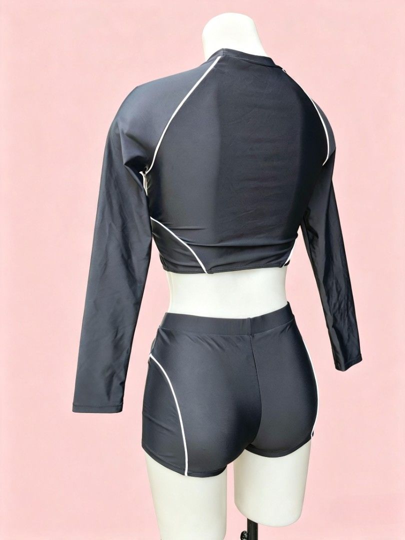 two piece rash guard short black (Category: Rash guard) located in Cavite. Submitted by matsof (Listing ID 1457753874, Image 2). Description: padded chest fix price.