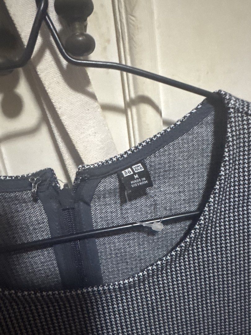Uniqlo Houndstooth Short Sleeve Romper Size M (Category: Rompers) located in Manila. Submitted by jam_isa21 (Listing ID 1457884090, Image 2). Description: - Uniqlo Houndstooth Print Romper - Size: Medium (M) - Features short sleeves - Convenient back zipper closure - Fitted waist with stylish pleated shorts - Versatile for casual outings or dressing up.