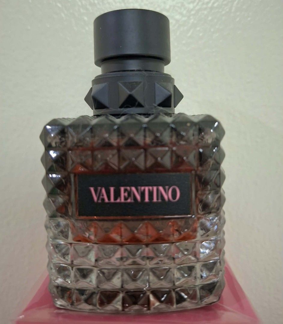 Valentino Donna Born In Roma Eau de Parfum (Category: Fragrance & Deodorants) located in Quezon City. Submitted by Alra888 (Listing ID 1457798710, Image 3). Description: - Valentino Donna Born In Roma Eau de Parfum - Size: 50ml Authentic - Scent Profile: Floral and Woody - Key Notes: Blackcurrant, Jasmine, Vanilla - Versatile: Suitable for everyday wear or special occasions - Design: Iconic studded bottle.